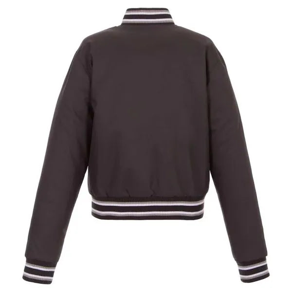 Dark gray jacket with striped cuffs and collar on a white background in USA