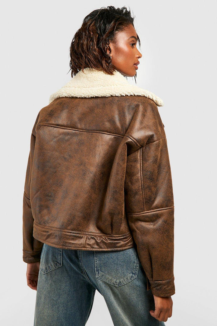 Fashionable women's leather aviator coat in UK style