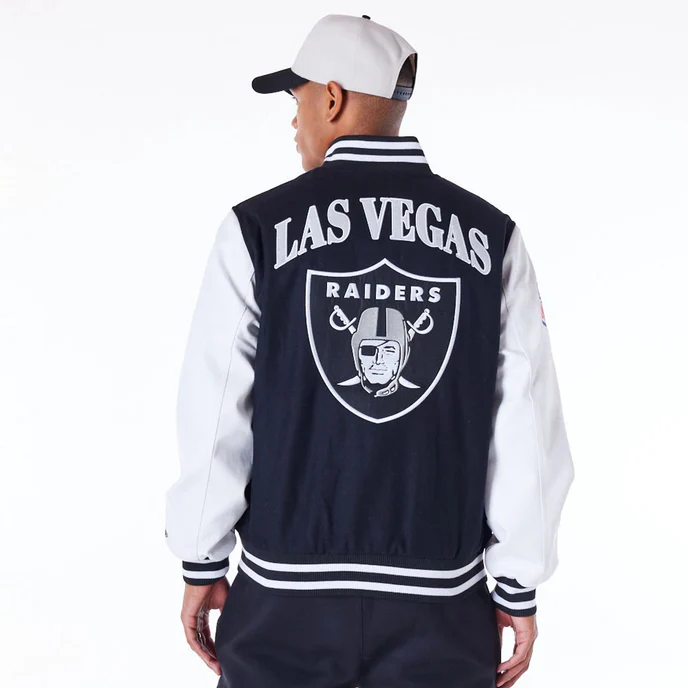 Stylish black varsity jacket featuring Las Vegas Raiders team patch in USA