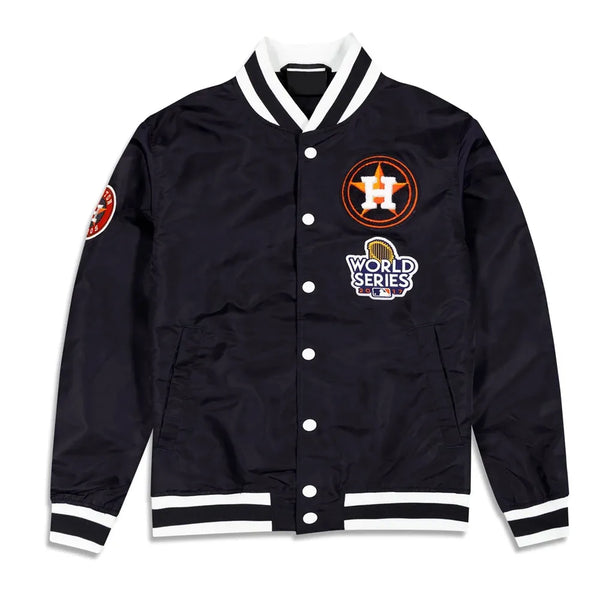 Black varsity jacket with sports team logos on a white background