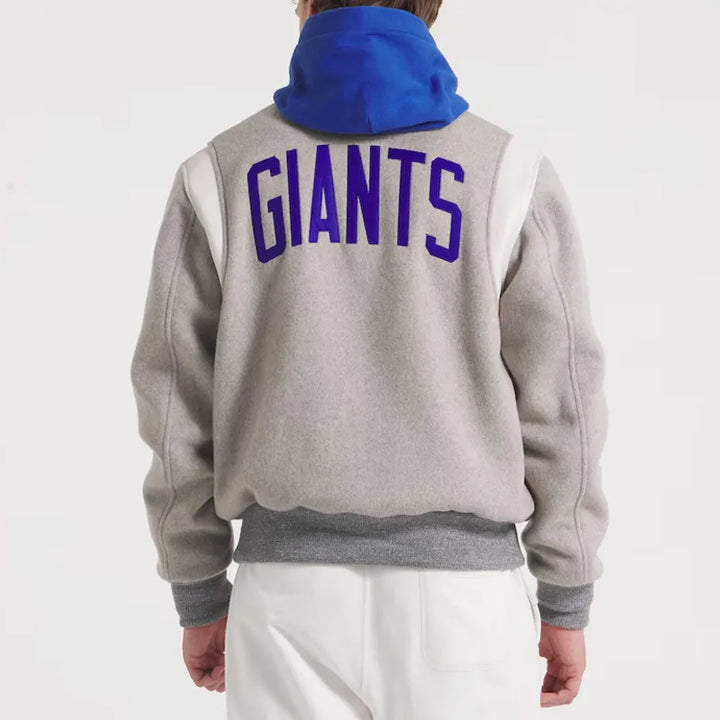 Gray sweatshirt with 'GIANTS' printed on the back, worn by a person against a white background