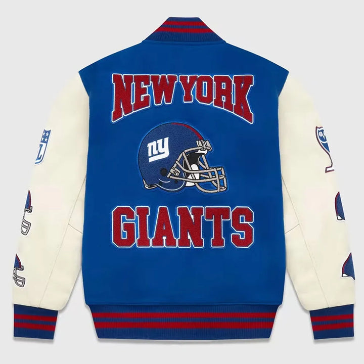 Blue and white letterman jacket with 'New York Giants' text and logo on a light gray background