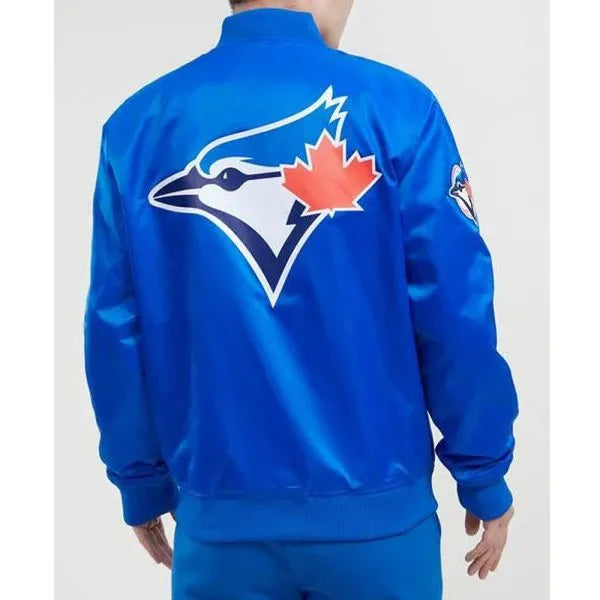 Blue sports jacket with a logo on the back against a white background in USA
