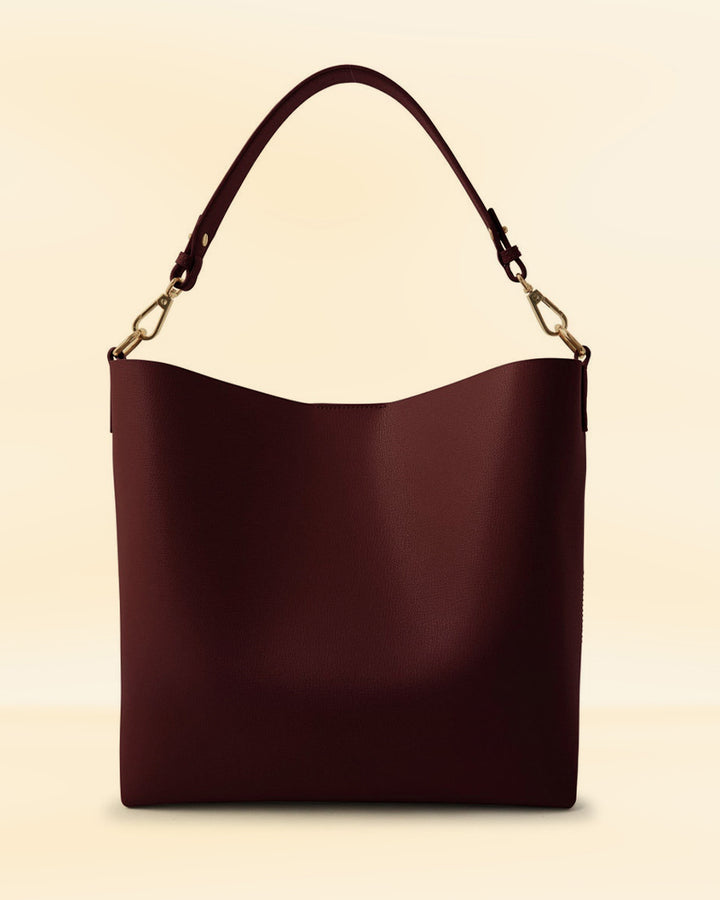 Discover the perfect combination of style and functionality in the Leather Legacy Satchel