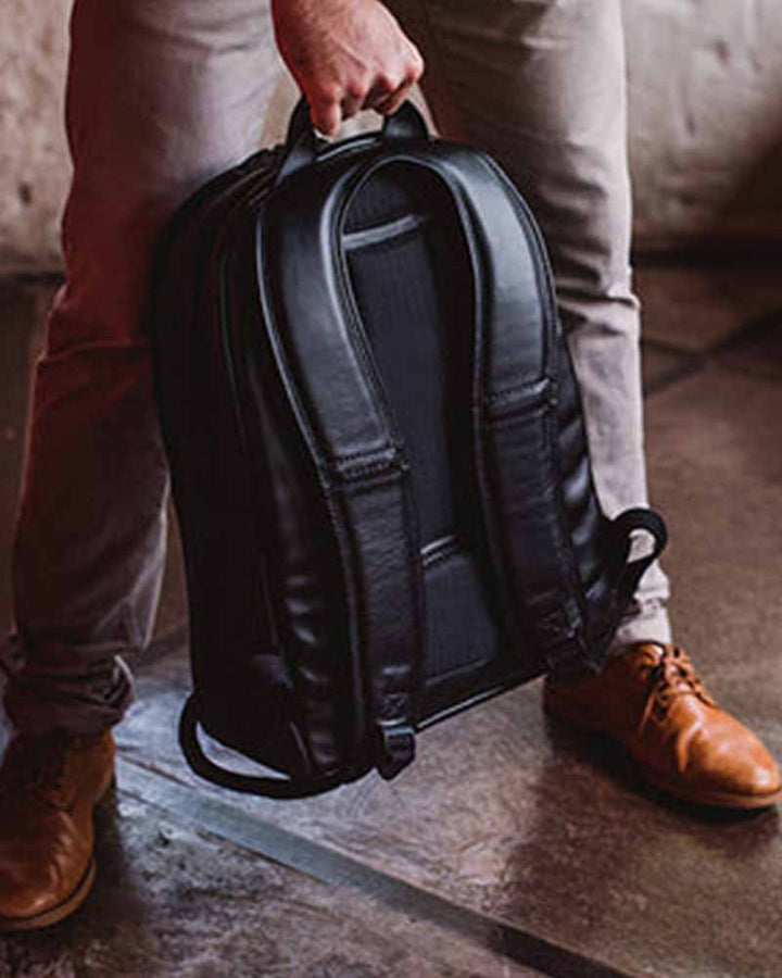 Spacious Leather Backpack with Removable Laptop Sleeve. in American style