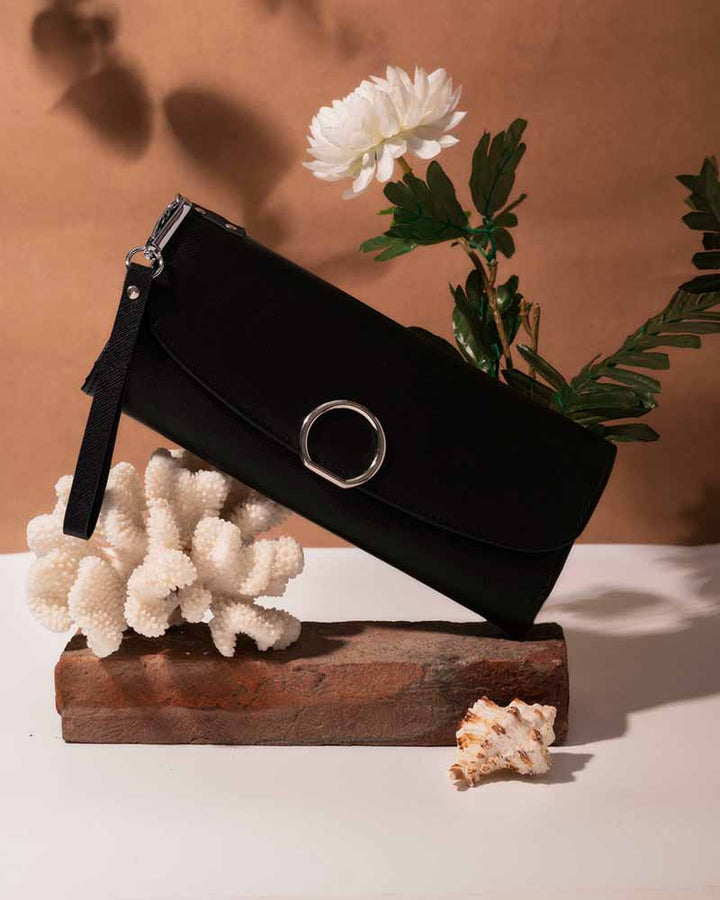 Chic wristlet clutch with tassel detail in UK
